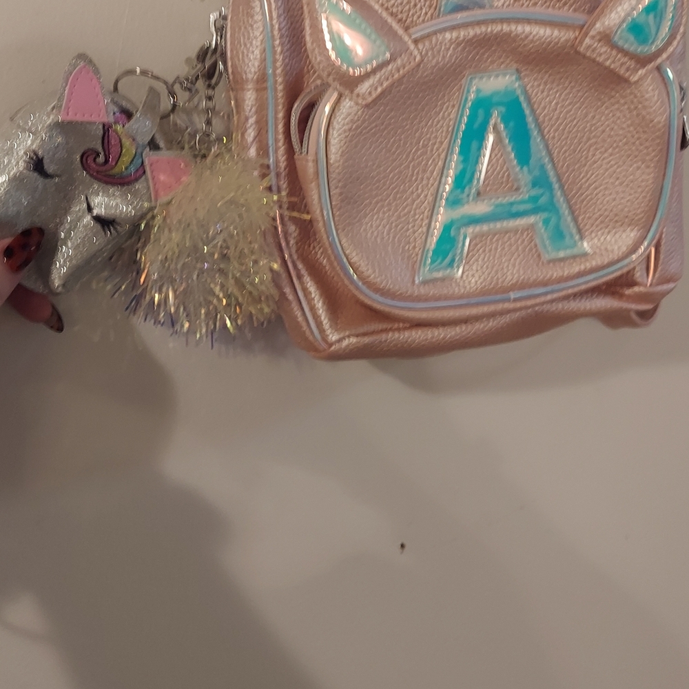 Justice Unicorn Backpack NWOT with Pom Pom "A" front, with attachable pouch. - Picture 6 of 11